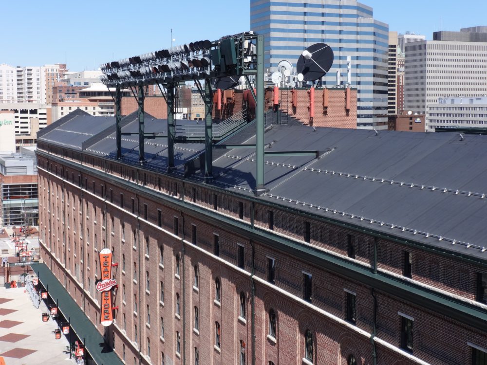 Pipe style snow retention system from Alpine SnowGuards installed on membrane roof surface at Camden Yards in Baltimore, Maryland.