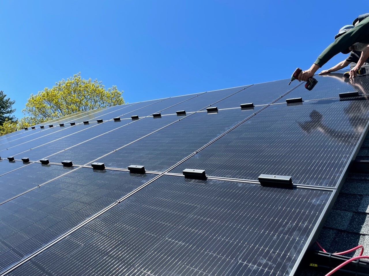 Product installation of Solar SnowDog hybird-style snow guards designed to protect solar arrays, wiring, and mounts from snow and ice damage.