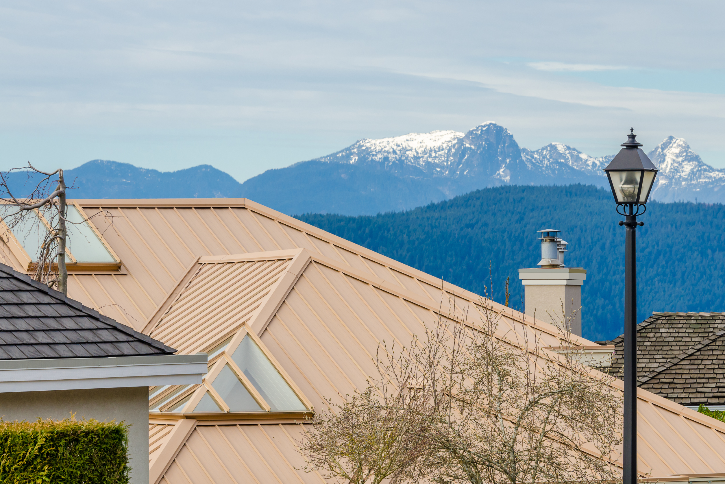 New standing seam metal roof with steep pitch. 